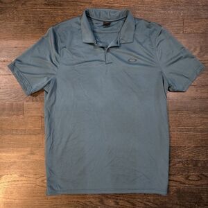 Rare Vintage Oakley Men's Blue Polo Shirt